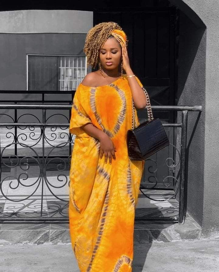 Auteur de style, tissus vibrants, mode africaine, expression créative, héritage culturel,